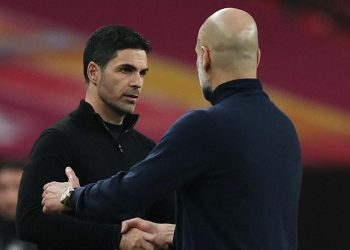 Guardiola’s dance of joy as Man City pile pressure on desolate Arsenal