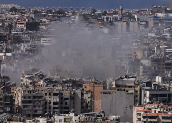 Israel pounds Beirut suburbs after Hezbollah launches rocket barrage