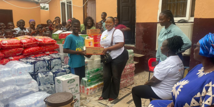 vera couch partners with opokua ahwenee foundation to donate food items to awoshie orphanage